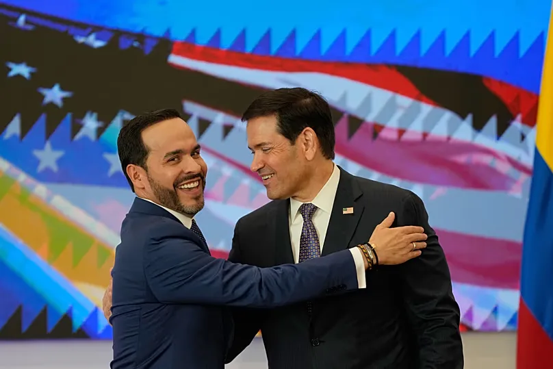 Colombian President Abelardo De La Espriella, left, and U.S. Secretary of State Marco Rubio embrace during a bilateral agreements signing ceremony in Barranquilla, Colombia.