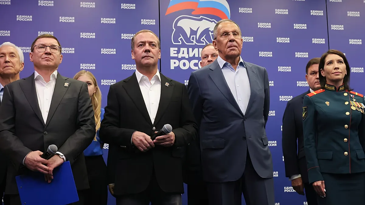 United Russia party's Dmitry Medvedev, center, and Russian Foreign Minister Sergey Lavrov, center right, watch preliminary voting results. 21 September, 2026.