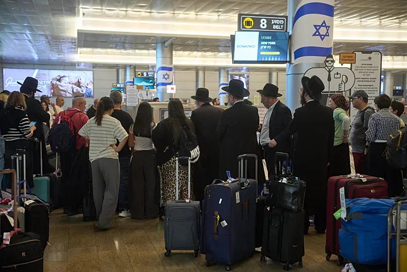 Travelers arrive at Ben Gurion Airport, 25 June, 2025