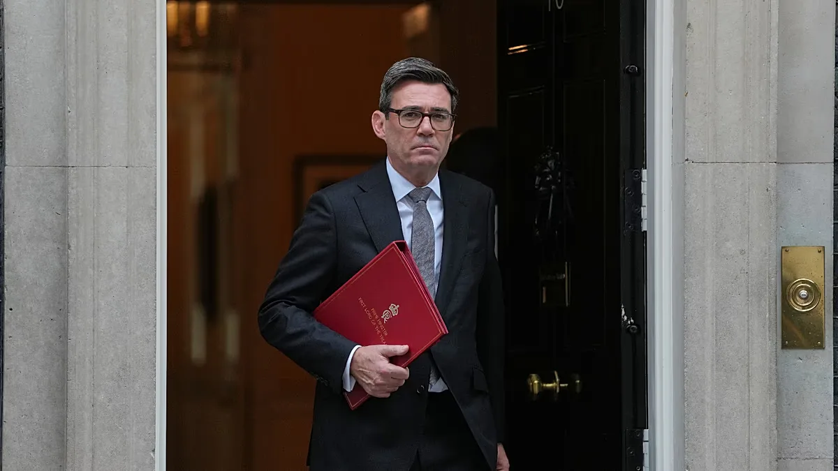 Britain's Prime Minister Andy Burnham leaves 10 Downing Street to attend parliament in London, Wednesday, Oct. 21, 2026. (AP P