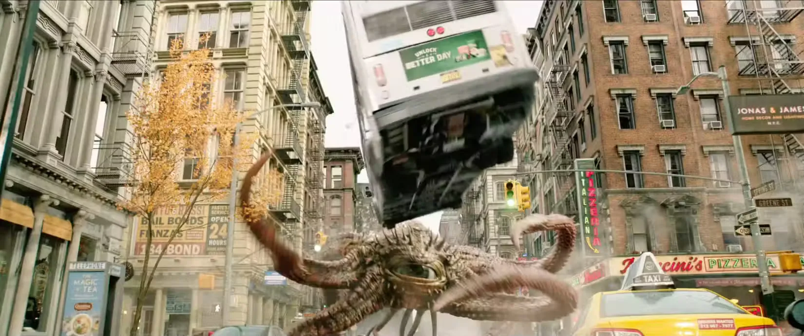 Shuma-Gorath, a tentacle monster with a central eye, hurls a bus at the camera in Doctor Strange in the Mountains of Madness. 